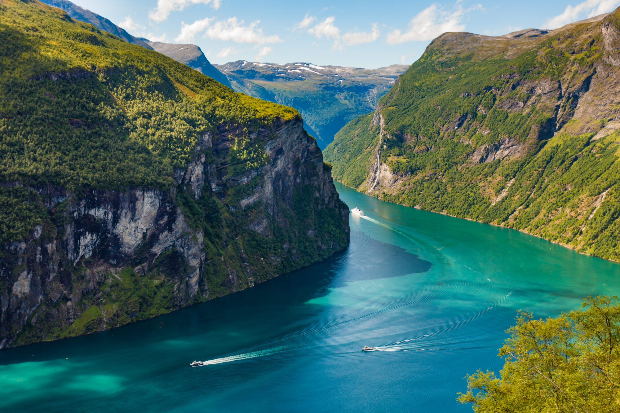 Fjord,Geirangerfjord,With,Ferry,Boats,,View,From,Ornesvingen,Viewing,Point,