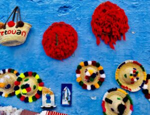 Colorful,Hats,In,Blue,Wall.,Chefchaouen,Blue,City,Medina,In